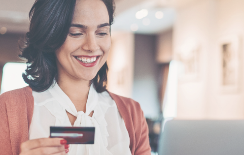 Deliver an e-commerce journey that delights. Optimize UX and digital touchpoints to turn browsers into buyers—just like this satisfied online shopper.